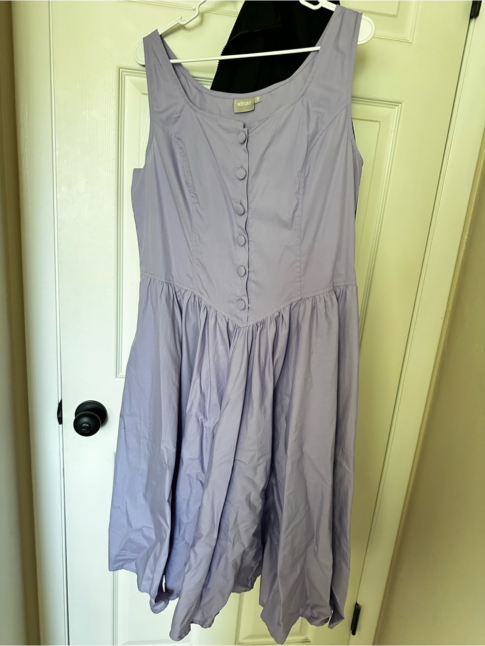 Lavender dress. Buttoned details. Pockets